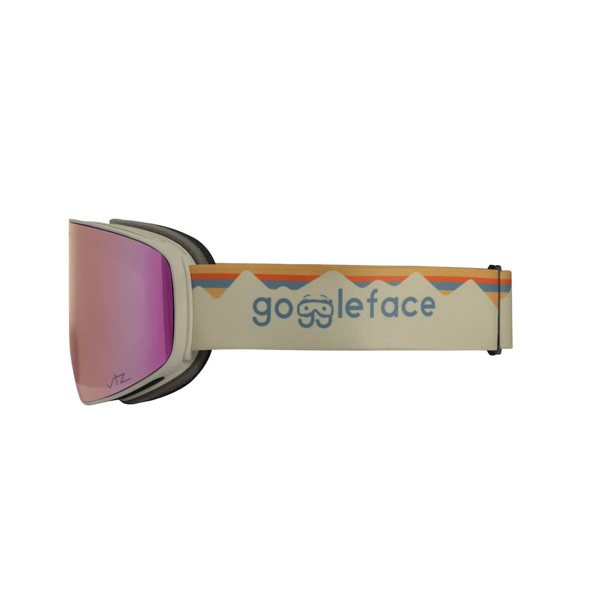 Side view of Straight Line | Alpine Retro with a wide, wrap-around pink-tinted lens. The adjustable strap is beige with a pattern of orange and white triangles, featuring the text "Goggleface" in blue and an illustration of goggles in the center. Perfect for your next winter adventure!